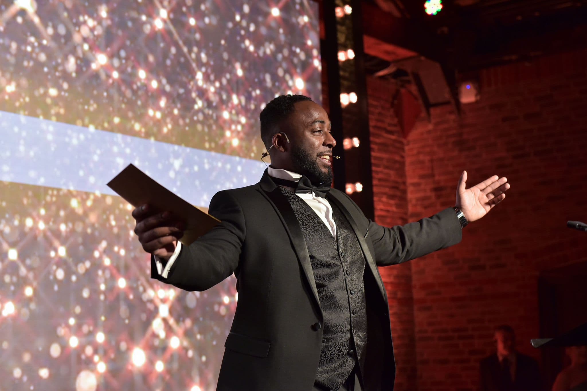 Cameron Murrell speaking on stage